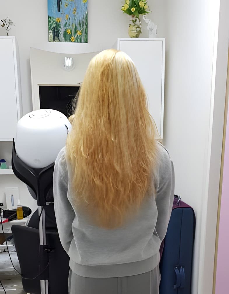 Lang blond haar, van achteren gezien
